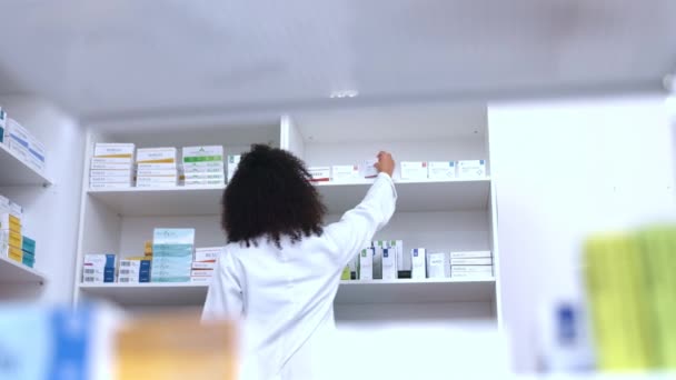 Pharmacist Manager Sorting Medical Stock Shelves Chemist Closeup Face Serious — Vídeo de stock