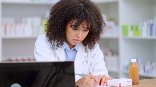 Young Busy Pharmacist Checking Her Computer While Stock Taking Dispensing — Vídeos de Stock