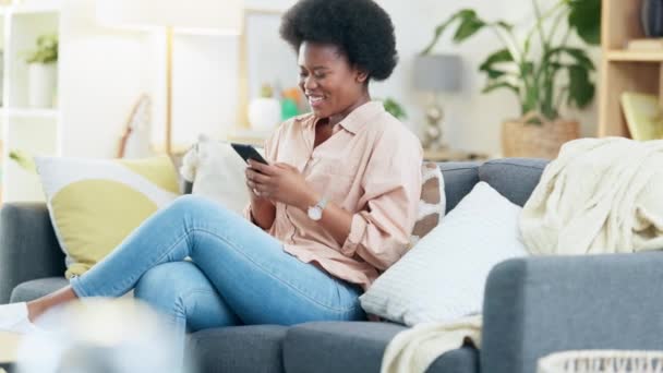 Young Woman Excited Text Phone Sitting Couch Laughing Social Media — Stock video