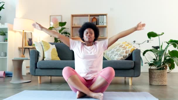 Afro Woman Doing Yoga Meditation Home One Calm Spiritual Female — стоковое видео