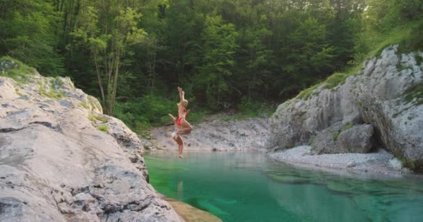 Two Friends Excitedly Jumping Lake Together Swim Two Women Having — Stok Video