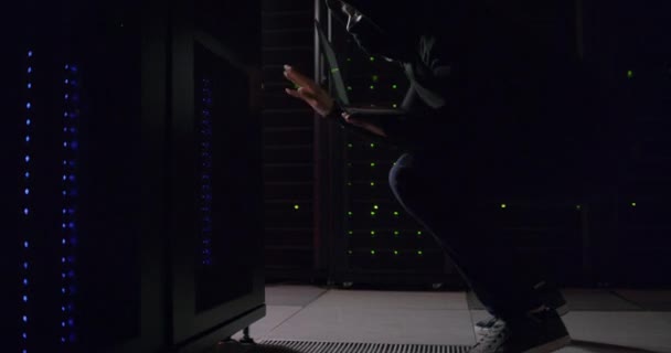 Video Footage Hacker Using Laptop Server Room — ストック動画