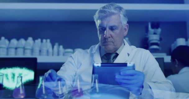 Mature Lab Scientist Testing Chemical Reactions Beaker Recording Data Tablet — Vídeo de Stock