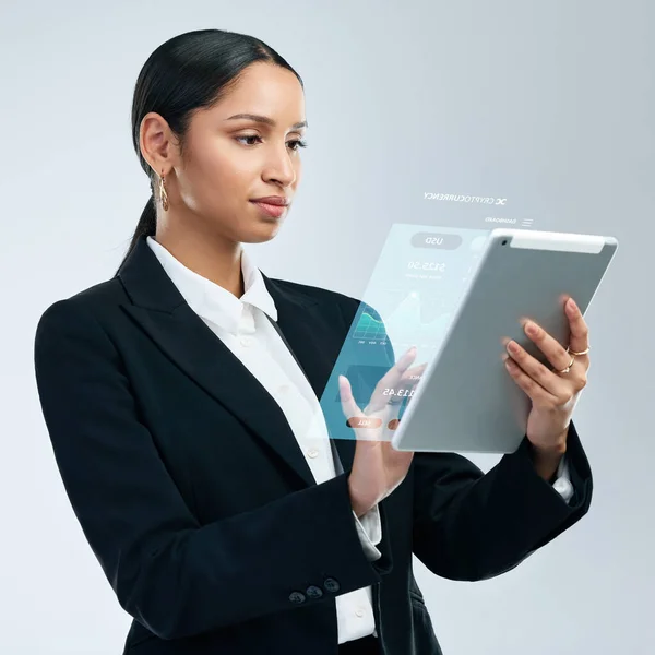 Every time you borrow money, youre robbing your future self. a young woman using a tablet against a grey background