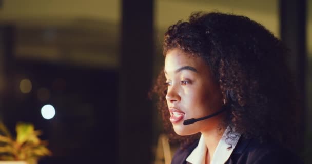 Young Female Call Center Agent Consulting Clients While Working Late — Stockvideo