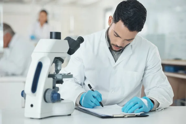 Better Record Young Scientist Writing Notes While Using Microscope Lab — Stok fotoğraf