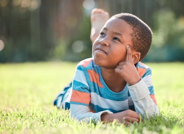 Let Think Young Boy Lying Grass — Stockfoto