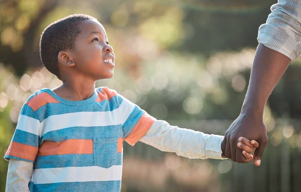 Going Young Boy Holding His Fathers Hand While Walking —  Fotos de Stock