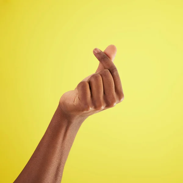 Ching Studio Shot Unrecognisable Man Rubbing His Fingers Together Yellow — Stock Photo, Image