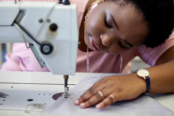 Sewing Precise Work Attractive Young Seamstress Using Sewing Machine While — 图库照片