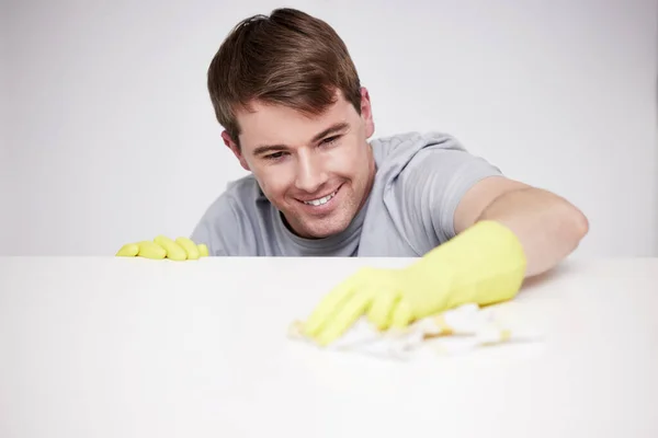 Almost Missed Spot Young Man Cleaning Counter Home — стоковое фото