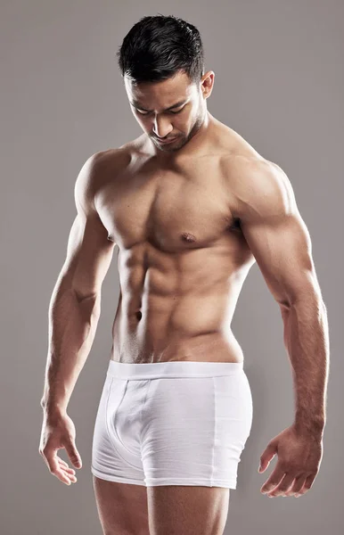 Showing His Rock Hard Abs Studio Shot Muscular Young Man — Stock Photo, Image