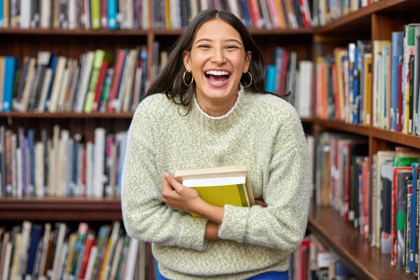 Librarians are tour-guides for all of knowledge. a female standing in a library