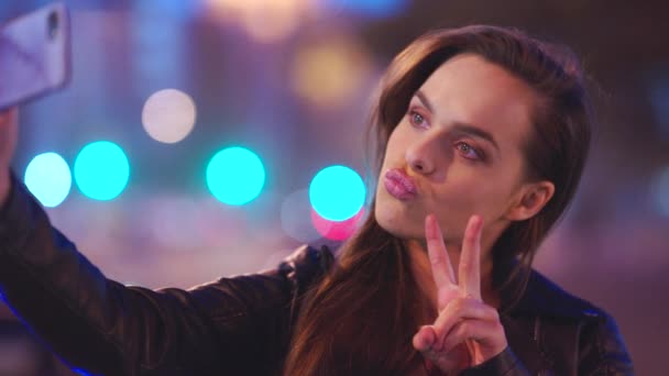 Playful Young Woman Pouting Making Peace Signs Taking Selfies Her — Vídeos de Stock