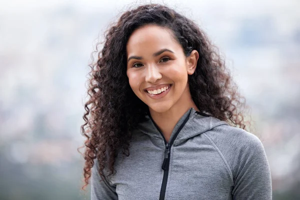 Nothing makes you feel as good as a good workout does. Closeup shot of a fit young woman out for a workout