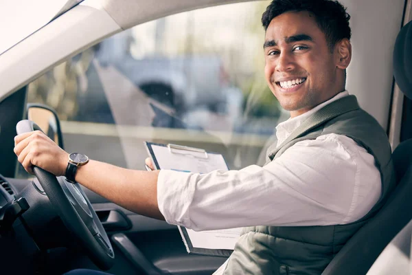 On time, every time. a delivery man holding a clipboard while dropping off orders