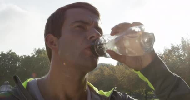 Video Footage Young Man Taking Break Fro Jogging Drink Water — Wideo stockowe