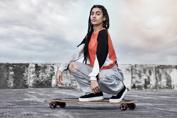 Unbeatable Board Cropped Portrait Attractive Young Female Skater Crouching Her — Stockfoto