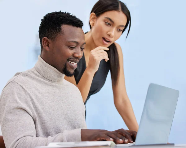 This is an idea we could work with. two businesspeople working together on a laptop in an office