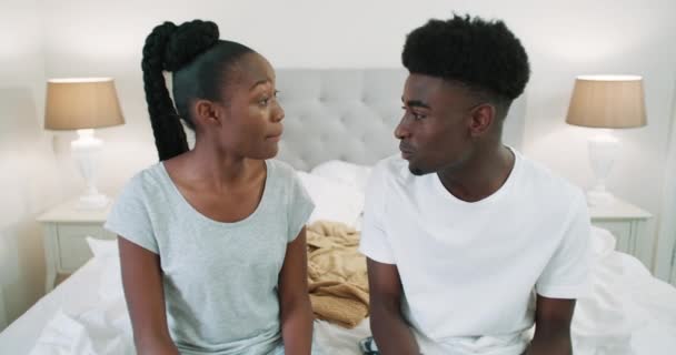 Video Footage Young Couple Having Argument While Sitting Bed Home — Stockvideo