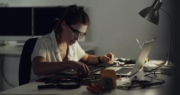 Video Footage Young Female Technician Repairing Computer Hardware — Stockvideo