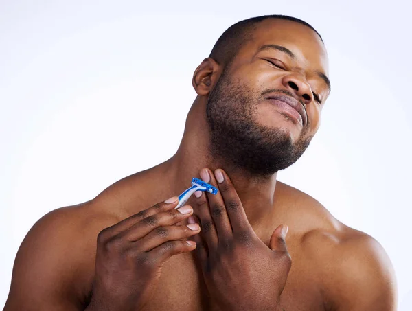 Studio Shot Handsome Young Man Wincing Pain Cutting Himself While — Φωτογραφία Αρχείου