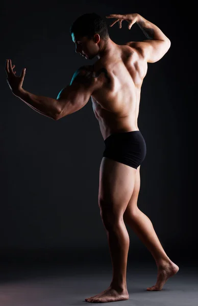 All Your Might Athletic Young Man Posing Shirtless Dark Background — kuvapankkivalokuva