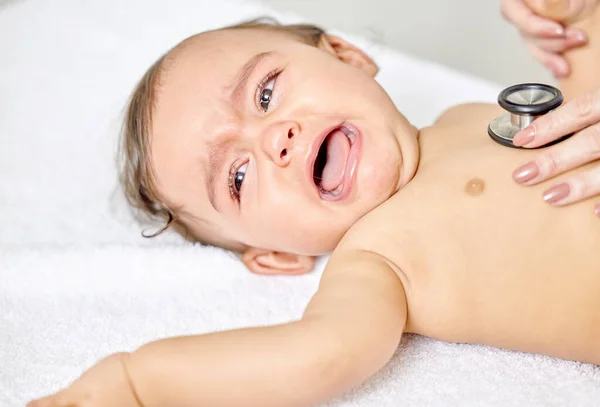 Getting Out Here Little Baby Having Its Chest Checked Female — Stockfoto