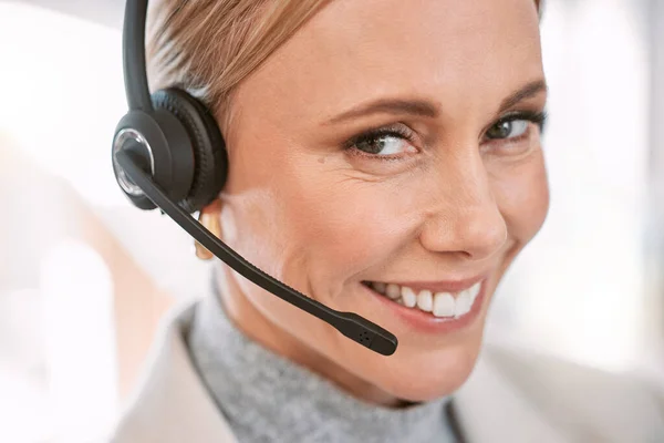 How may I direct your call. Cropped portrait of an attractive mature female call center agent wearing a headset while working in her office