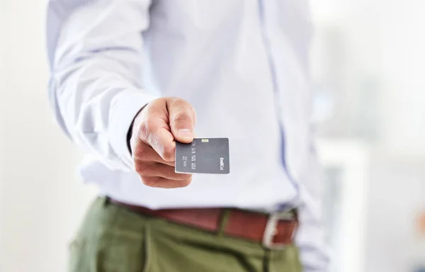 Finance, credit and banking with a card to pay, buy or purchase insurance, make an investment or open a savings account. Payment made simple, easy and convenient when shopping or spending money.