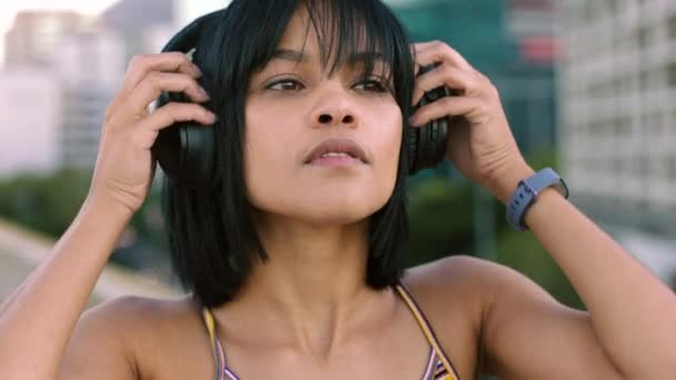 Woman Headphones Listening Music Streaming Songs Closeup Portrait Face Head — Stockvideo