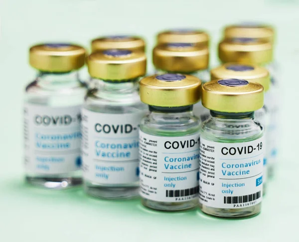 Lets Kick Covid Curb Studio Shot Vaccine Tubes Green Background — стоковое фото