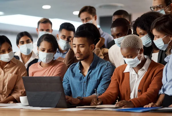 Make it even better the next time round. a group of young businesspeople using a laptop at a conference in a modern office