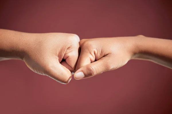 Ultimate Teamwork Two Unrecognizable People Fist Bumping Studio Red Background — Fotografia de Stock