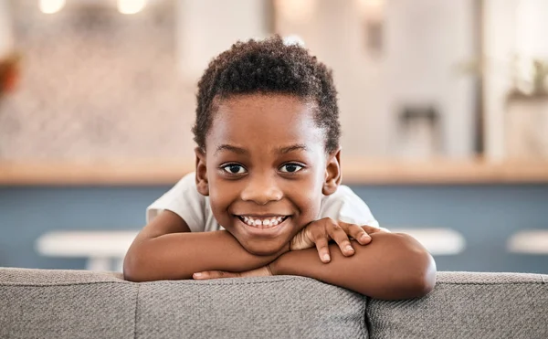 Your best self is your happiest self. Portrait of an adorable little boy relaxing on the sofa at home