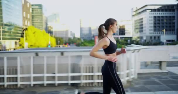 Video Footage Attractive Young Woman Checking Time While Out Jogging — 비디오