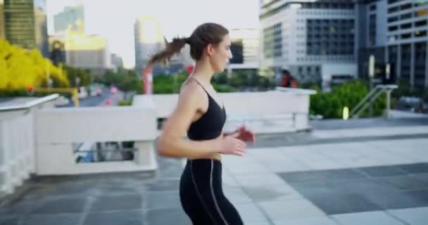 Video Footage Attractive Young Woman Checking Time While Out Jogging — Vídeo de Stock