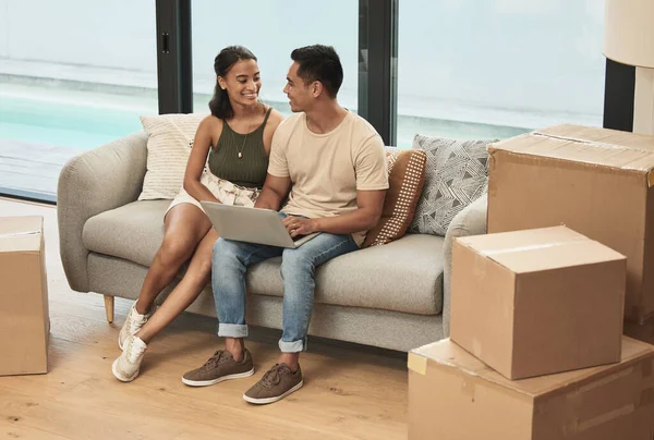 After you love it, you simply call it home. a couple using a laptop at home