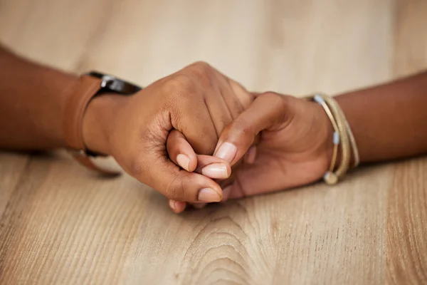 With you holding my hand, I can get through anything. two unrecognizable people holding hands at home