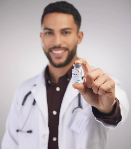 Life Saver Bottle Handsome Young Doctor Standing Alone Studio Holding — Stockfoto