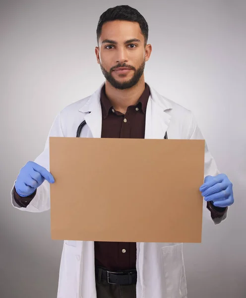 Hope You See Handsome Young Doctor Standing Alone Studio Holding — Stockfoto