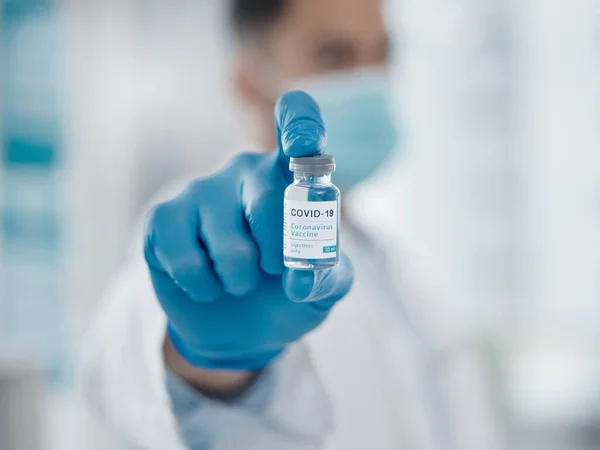 Vaccine Here Closeup Shot Bottle Covid Vaccine Being Held Screen — Φωτογραφία Αρχείου