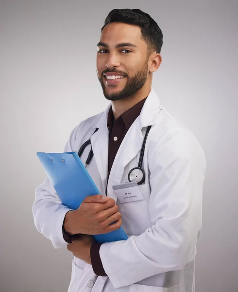 Ready Some Lives Handsome Young Doctor Standing Alone Studio Holding — ストック写真