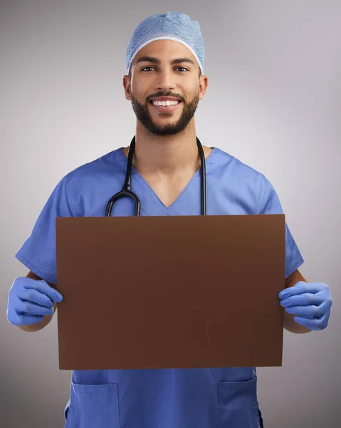 Need Say Louder Handsome Young Nurse Standing Alone Studio Holding — Foto Stock