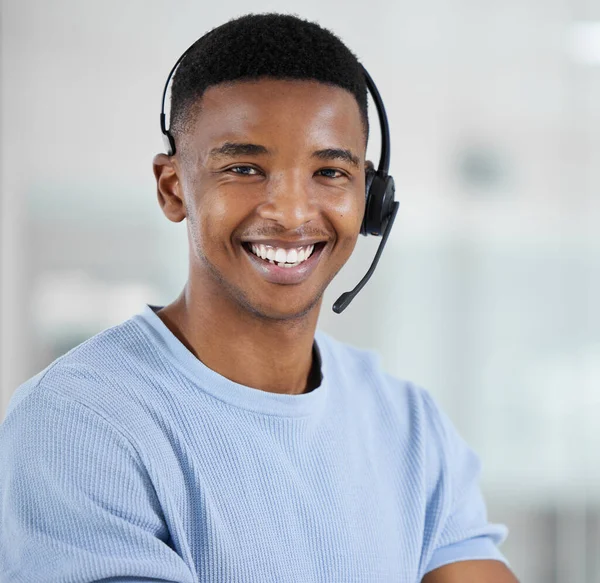 Building customer loyalty starts with exceptional customer service. Portrait of a young businessman working in a call centre