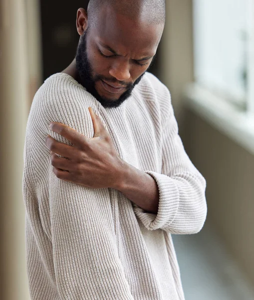 Wonder Caused Pain Young Man Touching His Arm Home — Stock Photo, Image