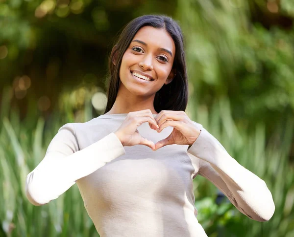 Lets Spread Love Beautiful Young Woman Forming Heart Shape Her — Stock Fotó