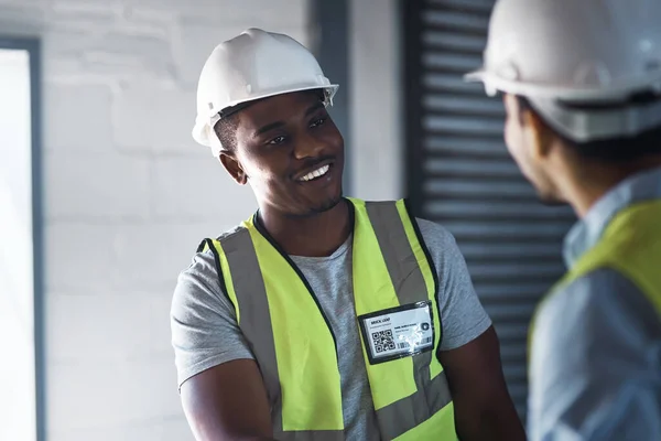 Leave Two Young Contractors Standing Warehouse Together Having Discussion — Fotografia de Stock