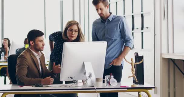 Team Discussing Ideas While Looking Computer Modern Office Colleagues Consulting — Vídeo de stock