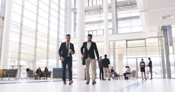 Two Business Men Walking Arriving Attending Conference Seminar Workshop Convention — Stockvideo